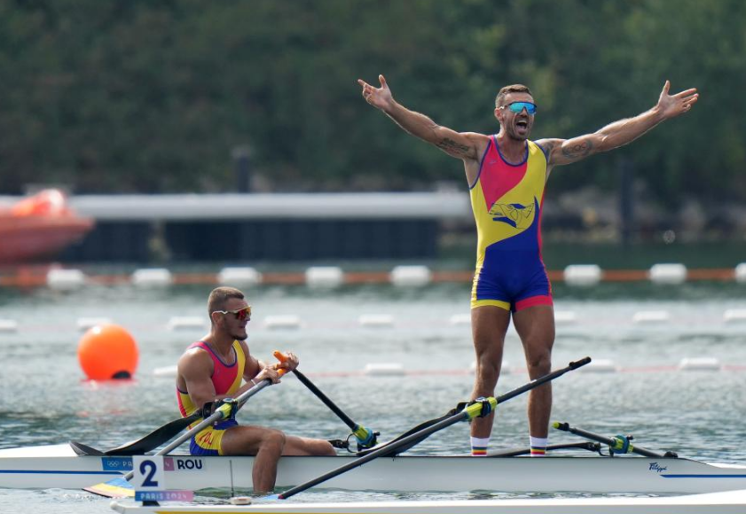 爱游戏官网网页版入口-罗马尼亚田径选手高超技术，取得胜利